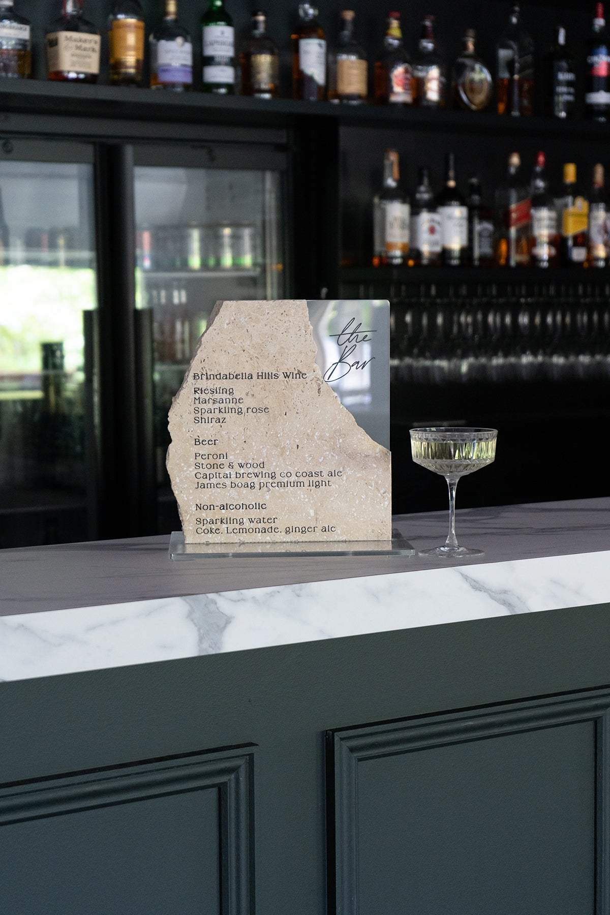 Hire Travertine Bar Sign