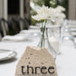 Hire Travertine Written Table Numbers